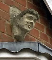 Sculpture of Jane built into the garage at Avebury