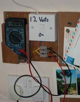 The 12 volt supply terminals and meter in our scullary