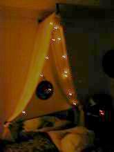 Our softly lit bed