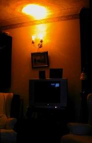 One of the four wall lights in our lounge