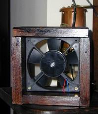 The 12V solar fan by the reading chair