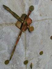 The hands and face of the peace clock