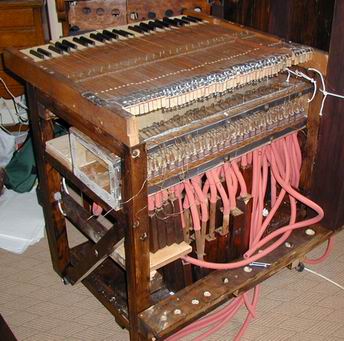 The organ from the back with pipes removed showing the action