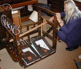 Mo operating the hand-pumped bellows